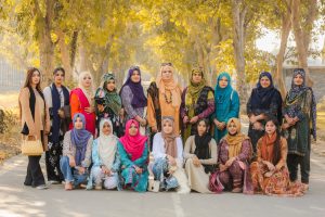 Group photo of women educators from Shakarganj Evergreen School gathered outdoors for a special occasion.